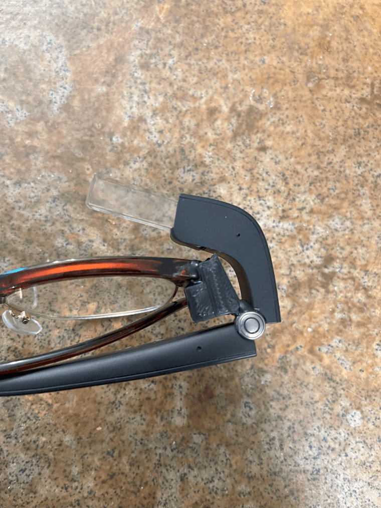 Google Glass attached to the custom glasses mount